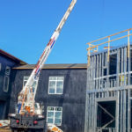 Setting steel and wooden trusses